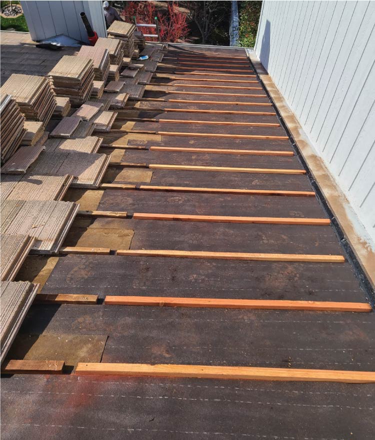 Professional Roof Leak Repair in progress